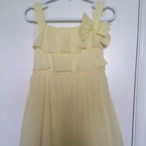 A size 5 Sweet Heart Rose, yellow Easter dress.